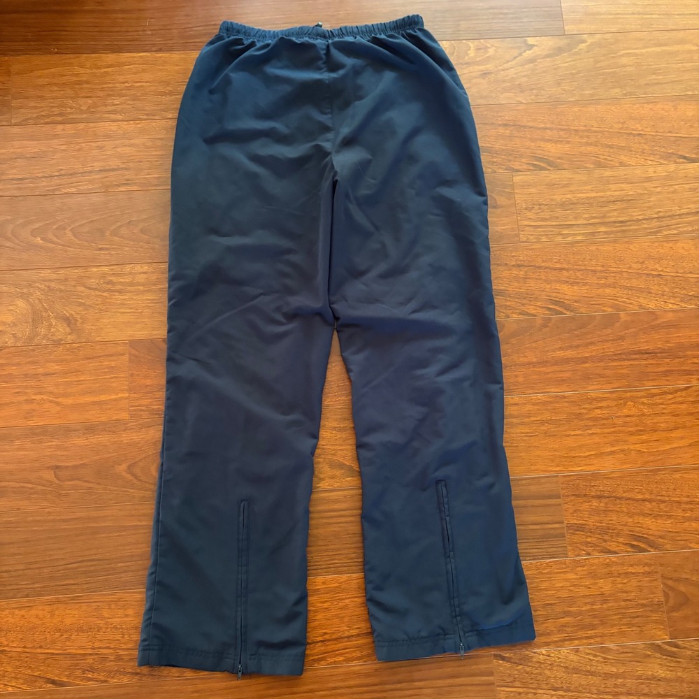 Reebok Mens Track Pants Size M Navy Blue Nylon Windbreaker Ankle Zip Warm Up